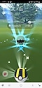 An in-game screen recording of a pokeball shooting up into the air and back down repeatedly in front of a shiny green Trapinch pokemon. The pokeball is switched and thrown to catch the Trapinch.