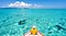 A man sitting on a boat is looking at the blue sea, and the scene was taken as beach holiday pictures.