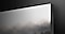 A zoomed in shot to the corner of The Wall display against a dark background to show the sleek design of the product