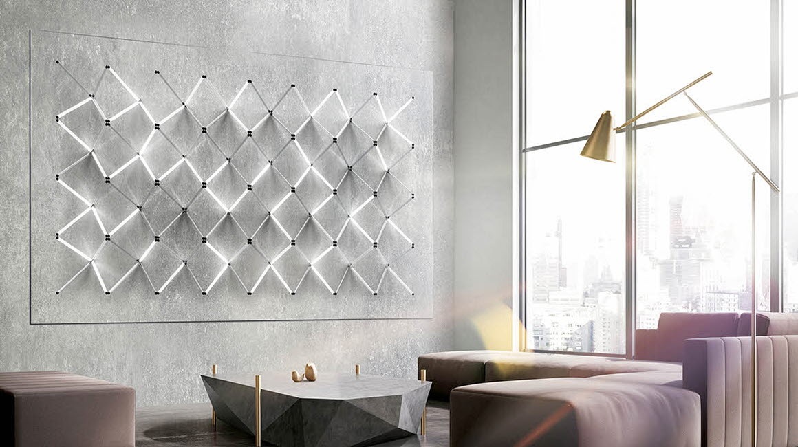 The Wall display in a modern penthouse living room set to a neon light grid décor mode