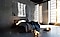 The Wall in a modern luxury apartment bedroom set to a waterfall décor setting