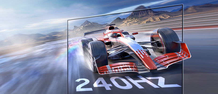 An open racing field. A red sports car races out of the screen. 240Hz.