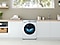 The QuickDrive™ washing machine is perfectly built into a laundry room. The washing machine looks sleek and refined, running smoothly and quietly.