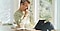 man sitting at desk with laptop