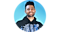 Headshot of MrWhoseTheBoss against a blue background. He's wearing a hoodie and smiling.