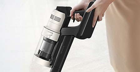 There is a closeup of a person holding a Bespoke Jet™ AI.