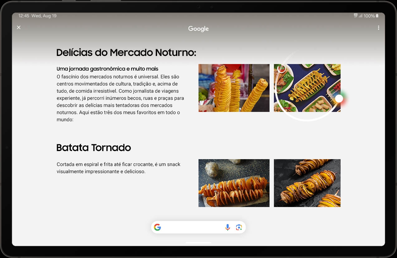 Galaxy Tab S9 no modo Paisagem com uma página web aberta sobre alimentos no mercado à noite. No canto superior direito da página estão duas imagens de batata tornado. A imagem na extrema direita é circulada, usando o recurso Circule para Pesquisar. Na parte inferior da página há mais informações sobre o objeto circulado, a batata tornado.