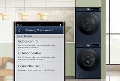 Galaxy phone with Smart Care near a Samsung washing machine