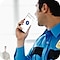 An officer holding Galaxy Note20 Ultra and using the Walkie Talkie function on Microsoft Teams.