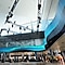 Curved type LED display surrounds airport terminal wall