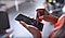 An over-the-shoulder shot of someone scheduling tasks on a Galaxy Note10 to master time management