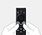 Drawn hands are pressing the Return and Play/Pause buttons simultaneously on a Samsung remote.