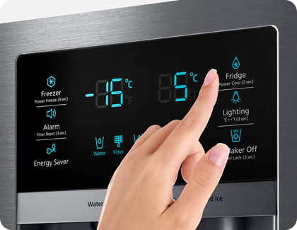 Hand selecting the fridge temperature on a Samsung control panel.