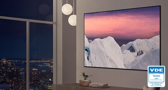 The TV screen emits a dim illumination, designed to be gentler on the eyes during nighttime viewing. Positioned at the bottom is the VDE logo, accompanied by the text VDE 02 2023 Circadian Rhythm Display www.VDEinfo.com ID. 40056418 Tested by VDE Germany.