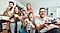 With a TV which is the best size tv for gaming, a group of friends is having fun while playing a game on a game console.