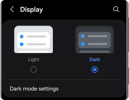 Display settings on a Samsung Galaxy phone with options for Light and Dark themes, with Dark selected.