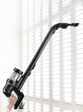 A Samsung Jet 90 stands upright on a Z-Station with various tools next to a Clean Station.