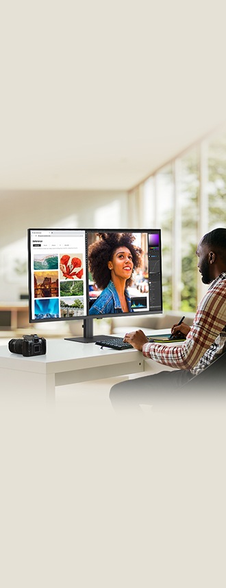 Une personne est en train de retoucher une image à l'écran. L'écran affiche plusieurs images et un outil de retouche.