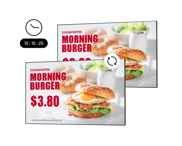 Two displays are promoting the morning menu. As the clock in the upper left corner approaches 11 o'clock, the displays are simultaneously switched to advertise the lunch set menu, and an icon indicates that the two displays are synchronized.