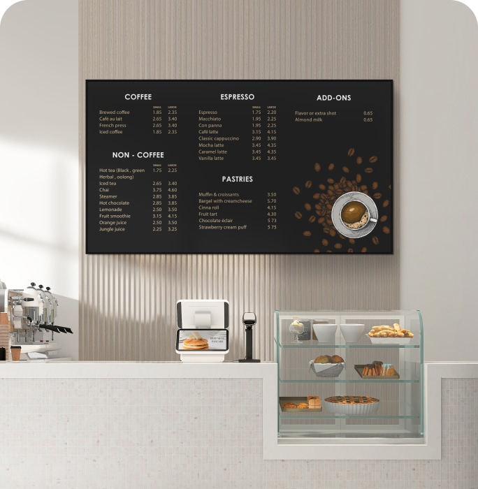 In the cafe, the display shows a menu board.