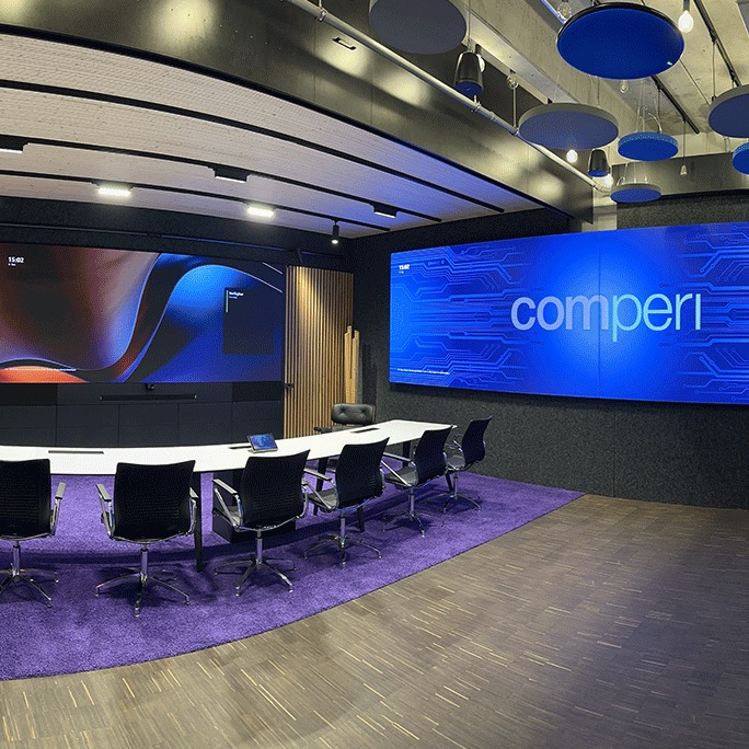 Zu sehen ist ein Meetingraum bei Comperi