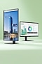Schwenkbarer Monitor, der ein Gebäude zeigt, neben einem horizontal ausgerichteten Monitor mit einem geöffneten Dokument.