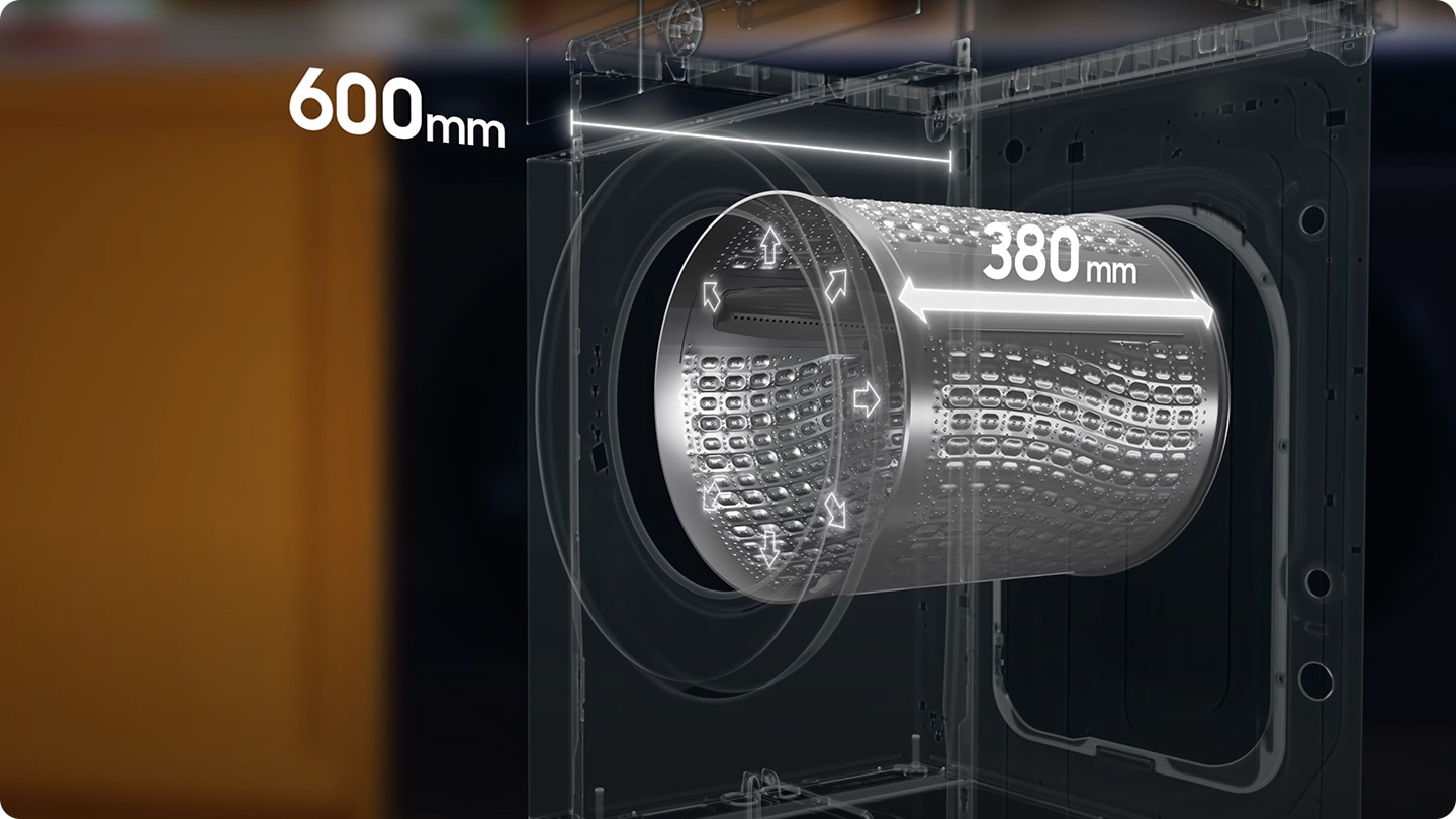 Schwarzes, maßgeschneidertes AI™ Waschmaschinen- und Trocknerset, das Seite an Seite unter einem Schrank installiert ist. Die Abbildung der inneren Struktur der Waschmaschine zeigt eine Tiefe von 600 mm. Die Tiefe bleibt gleich, da die Trommel der Waschmaschine von 300 mm auf 380 mm vergrößert wird. Die Breite und der Umfang der Trommel dehnen sich aus, sodass der Raum breiter aussieht.