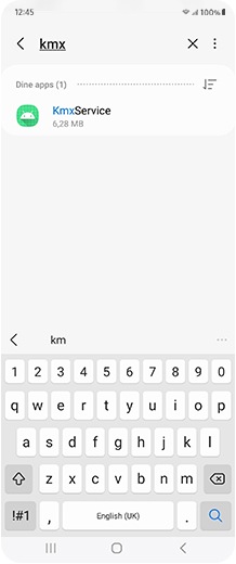 Smartphoneskærm, der søger efter KMX-tjeneste