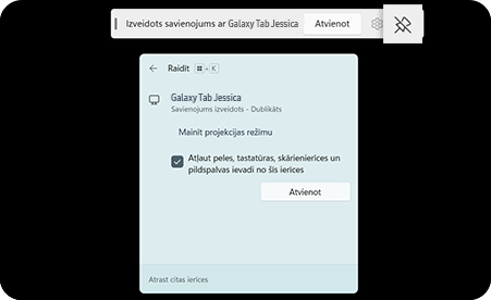 Planšetdatora ekrāns, kad tas ir savienots ar otru ierīci. Šajā ekrānā parādās rīkjosla ar pieskārienu īkšķa ikonai.