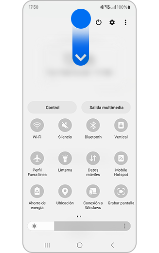 Imagen de la pantalla de inicio con el ícono de deslizar hacia abajo y el panel de acceso rápido.