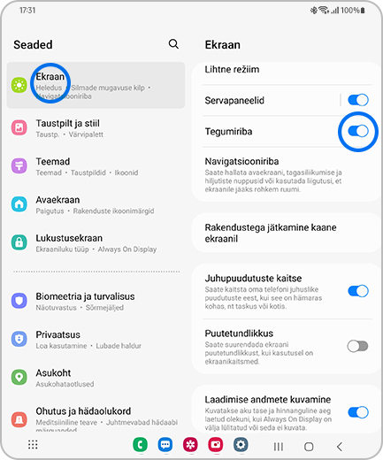 Ekraanid „Seaded“ ja „Ekraan“, kus on esile tõstetud valik „Ekraan“ ning valiku „Tegumiriba“ lülitusnupp.