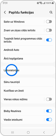 Skatiet ekrānu “Papildu funkcijas”, pieskaroties pie “Laboratorijas”.