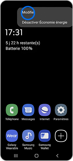 Vue de l’écran d’accueil avec un geste de pression sur l’option « Modifier ».