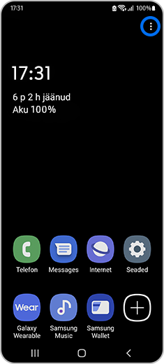 Aktiveeritud energiasäästurežiimiga avakuva, kus on märgistatud täiendavate valikute ikoon.