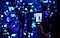 A Galaxy S20's screen which shows two people in a kaleidoscopic room and the Single Take feature being used on the phone.