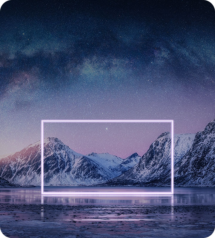 A portion of a majestic mountain range in the background is captured on a screen with highlighted borders.