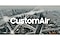 It's an illustrative image of a view from the sky overlooking a city with dense buildings, and white lines composed of repetitions of thin lines cross the image diagonally, and the word 'CustomAIr' is written in a thick font in the middle of the image.