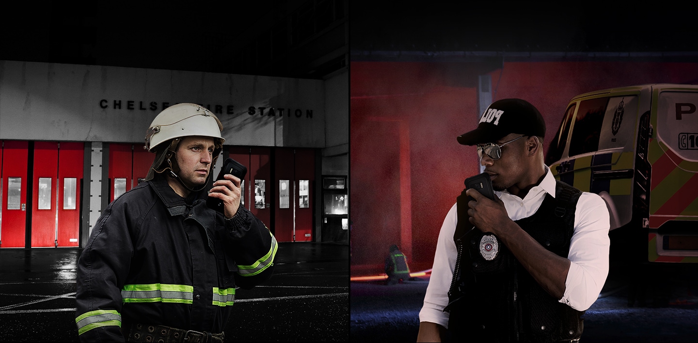 An image of a police officer and a firefighter talking about the scene with a smartphone with MCPTT system at the scene.