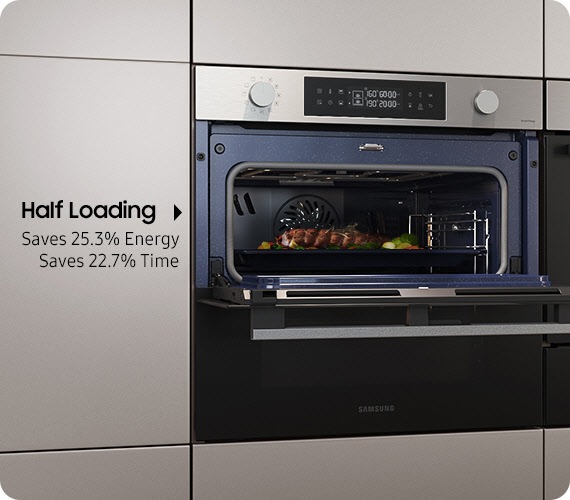 A Dual Cook Flex is placed between metal colored cabinets. Its door opens to reveal a large chicken and veggies on a large tray, indicating the ability to cook a large meal. Next, only the top compartment opens to reveal another dish, indicating cooking flexibility that also saves 25.3% energy and 22.7% time with Half Loading.
