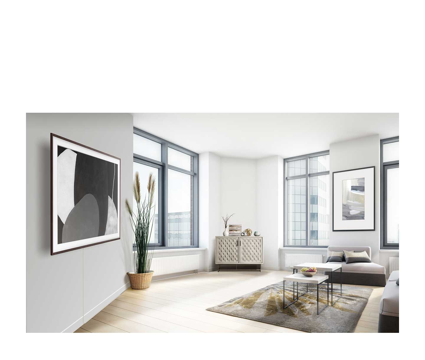 The Frame is hanging on a wall. A single One Invisible Connection neatly scales the wall and is organized within a cabinet away from view.