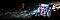 Five game characters with the Fortnite game logo are on a Gaming TV screen. The game title is in the background. Colorful strokes of light surround the Gaming TV.