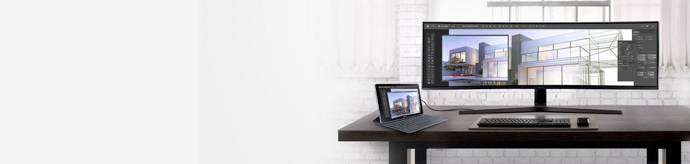 Ένα ultra-wide business monitor συνδεδεμένο με ένα notebook, δείχνοντας την ίδια εικόνα στην οθόνη