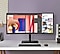 A monitor screen showing an editing app and a website.