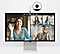 A meeting held online. A web cam is attached to the monitor.