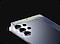 2 Galaxy S25 Ultra devices in Titanium Silverblue are stacked on top of each other. The bottom smartphone is in front view, and the top smartphone is in rear view with a close-up of the floating camera design.