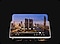 A city skyline is on the video player on screen and is popping out beyond the screen. The video run time is 31 hours.