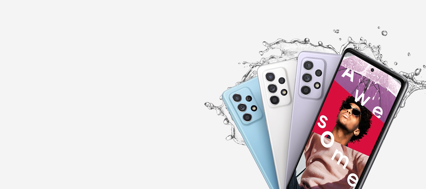 Four Galaxy A52 5G phones, fanned out. Three seen from the rear to show the rear camera and colors Awesome Blue, Awesome White and Awesome Violet. One is seen from the garis depan and onscreen is a purple umbrella, a man's head wearing sunglasses, and another person in a pink sweatshirt, with the word Awesome. Water is splashing on the phones.