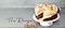 The Recipe: Coffee sponge cake topped with hazelnut meringue and fresh whipped cream is on a white plate.