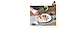 Step 4. The cucumber salad is plated at the center of the dish with three seared prawns, and the plate is being topped with a garnish of coriander, amaranth and other herbs.