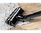 Head of a Bespoke AI Jet Ultra vacuuming a white carpet